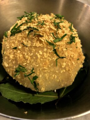 Whole baked celeriac with toasted yeast and herbs